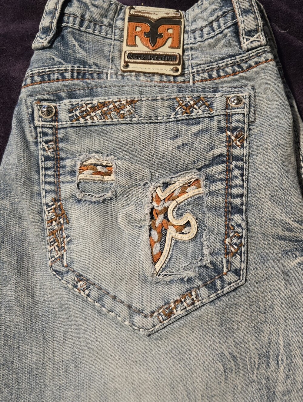 Rock Revival Light Blue Denim Boot Cut Jeans with Orange Accent Stitching